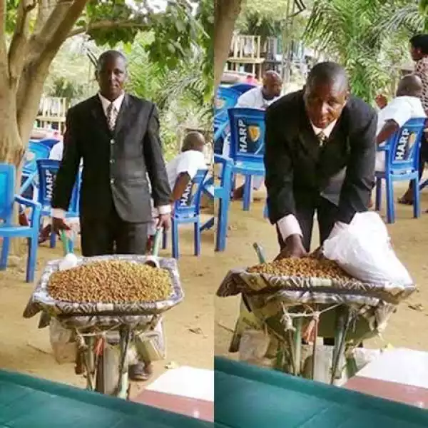 Hawking with Class: Photos of a Man Dressed in Suit and Selling Tiger Nuts in Wheelbarrow Goes Viral